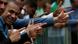 Fans of Bolsonaro making pistol-like hand gestures Fans of Bolsonaro making pistol-like hand gestures