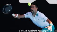 Serbia's Novak Djokovic makes a forehand return to United States' Frances Tiafoe during their second round match at the Australian Open tennis championship in Melbourne, Australia, Wednesday, Feb. 10, 2021.(AP Photo/Rick Rycroft)