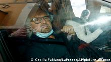FILE -- In this Feb. 9, 2021 file photo, Five Star Movement's Beppe Grillo arrives to meet with former European Central Bank chief Mario Draghi, at the Chamber of Deputies, in Rome. The populist 5-Star Movement, the Italian Parliament’s largest party, is holding off for now on committing to back the new government Mario Draghi is trying to assemble. (Cecilia Fabiano/LaPresse via AP)