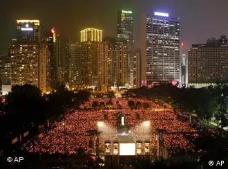 Tens of thousands of people attend a candlelight vigil at Hong Kong's Victoria Park Friday, June 4, 2010, to mark the 21st anniversary of the June 4th Chinese military crackdown on the pro-democracy movement in Beijing. (AP Photo/Kin Cheung)