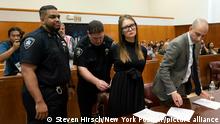 09/05/2019 Anna Sorokin, center, and her lawyer Todd Spodek, right, arrive for her sentencing at New York State Supreme Court in New York, Thursday, May 9, 2019. Sorokin, who claimed to be a wealthy German heiress, was sentenced to four to 12 years behind bars for defrauding New York banks and hotels. (Steven Hirsch/New York Post via AP, Pool)
