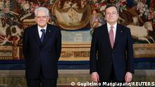 Italian President Sergio Mattarella and Prime Minister Mario Draghi pose for a photo after the new cabinet ministers swearing-in ceremony, at the Quirinale Presidential Palace in Rome, Italy, February 13, 2021. REUTERS/Guglielmo Mangiapane/Pool