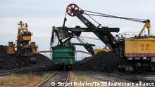 KRASNOKAMENSK, TRANSBAIKAL TERRITORY, RUSSIA - SEPTEMBER 17, 2020: Freight wagons are loaded with brown coal mined at the Urtuisky open pit mine, part of Priargunsky Industrial Mining and Chemical Union (PIMCU). In terms of sales of 2B/3B grade brown coal, the Urtuisky open pit mine is one of the leading brown coal deposits in the Russian market. PIMCU is the largest uranium mining company in Russia and is a subsidiary of ARMZ Uranium Holding Co (Atomredmetzoloto), which is part of the Rosatom State Corporation. Sergei Bobylev/TASS
