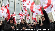 TBILISI, GEORGIA - FEBRUARY 18, 2021: Georgian opposition supporters gather outside an office of the United National Movement (UNM) Party founded by former Georgian President Mikheil Saakashvili. Georgia's Prime Minister Giorgi Gakharia resigned on February 18 following a court order to detain Nika Melia, chairman of the United National Movement party. Melia is charged with organizing an attack on the Georgian Parliament building during the 2019 Georgian protests triggered by the visit of Russian State Duma member Sergei Gavrilov to Tbilisi. David Mdzinarishvili/TASS