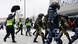 Journalists and security forces during a rally in Moscow. Journalists and security forces during a rally in Moscow.
