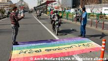 February 10, 2021, Tehran, Iran: People in Iran's capital city, Tehran took part in the drive-in rallies on their motorbikes and motorcycles passing LGBT flag to indicate their abhorrence of the LGBT community (Credit Image: Â© Amin Monfared/ZUMA Wire
