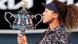 Naomi Osaka accepting the 2021 Australian Open trophy Naomi Osaka accepting the 2021 Australian Open trophy