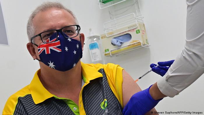 Australia's Prime Minister Scott Morrison receives a dose of the Pfizer/BioNTech Covid-19 vaccine