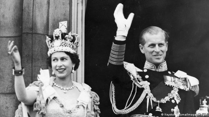 Queen Elizabeth and Prince Philip wave after their wedding