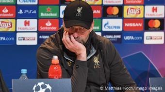 Jürgen Klopp looks unimpressed at a press conference