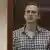 Alexei Navalny stands in court in Moscow, Russia