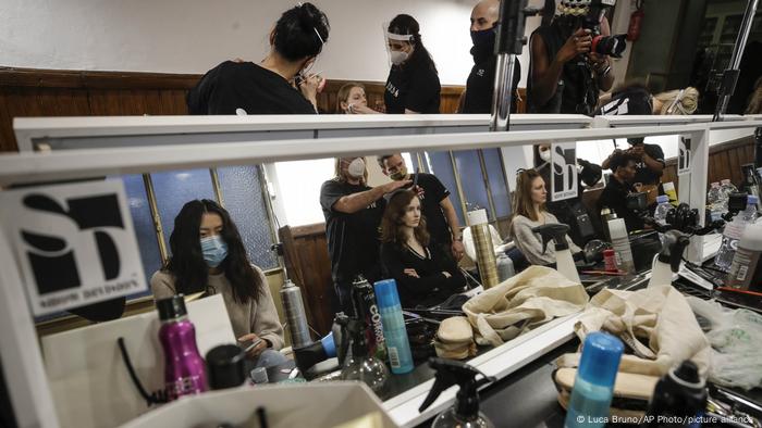 Models get make-up done in the backstage prior to the start of the Black Lives Matter Fall/Winter 2021/22 collective fashion show