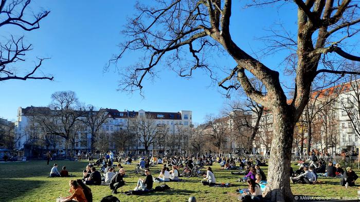 Berlin residents enjoy the weather in a park