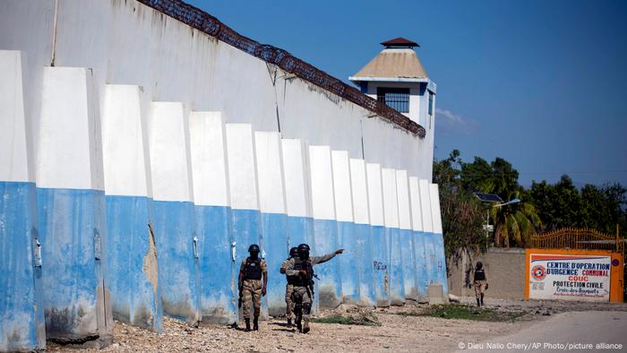 Security forces patrol the perimeter of the Croix-des-Bouquets prison