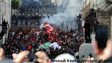 ALGIERS, ALGERIA - FEBRUARY 26: Algerian anti-government protesters take to the streets of the capital Algiers as the Hirak pro-democracy movement gathers renewed momentum after a year-long hiatus due to the coronavirus pandemic, on February 26, 2021. - Despite a ban on gatherings over Covid-19, crowds rallied in several neighbourhoods of Algiers in the early afternoon and marched toward the city centre. The Hirak protests were sparked in February 2019 over president Abdelaziz Bouteflika's bid for a fifth term, and the long-time leader was forced from power in April that year. Mousaab Rouibi / Anadolu Agency