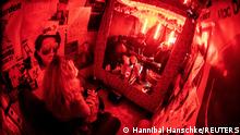 German rock band Milliarden (Billions) gives a concert in a van for a single fan separated by a plexiglass pane in Berlin, Germany, February 16, 2021. REUTERS/Hannibal Hanschke TPX IMAGES OF THE DAY
