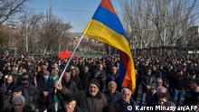 Opposition supporters rally outside the National Assembly building to demand the Prime Minister's resignation over his handling of last year's war with Azerbaijan, in Yerevan on February 27, 2021. - Armenian President Armen Sarkisian said on February 27, 2021, he had refused to sign a prime ministerial order to dismiss the army's chief of staff, deepening a national political crisis. (Photo by Karen MINASYAN / AFP)
