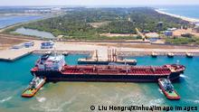 200408 -- COLOMBO, April 8, 2020 -- Aerial photo taken on April 2, 2020 shows the Marshall Islands-based Mt. Melody bunkering ship arriving at Hambantota International Port, Sri Lanka. Sri Lanka-China joint venture, Hambantota International Port HIP, is set to kick off fuel bunkering operations and support COVID-19 affected supply chains after a ship finished discharging low-sulphur fuel into the port s tanks on Tuesday afternoon. TO GO WITH:Sri Lanka s Hambantota port to support COVID-19 affected supply chains with low-sulphur fuel Photo by /Xinhua SRI LANKA-CHINA-JOINT VENTURE-PORT LiuxHongru PUBLICATIONxNOTxINxCHN