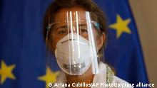 Feb. 24, 2021***
European Union Ambassador to Venezuela Isabel Brilhante Pedrosa wears a mask and face shield amid the COVID-19 pandemic, as she meets with Venezuelan Foreign Minister Jorge Arreaza at his office in Caracas, Venezuela, Wednesday, Feb. 24, 2021. The meeting was called after the EU sanctioned an additional 19 Venezuelans for undermining democracy and the rule of law in Venezuela and the National Assembly declared the EU ambassador persona non grata. (AP Photo/Ariana Cubillos)