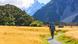 A hiker in mountains near Mount Cook, New Zealand A hiker in mountains near Mount Cook, New Zealand