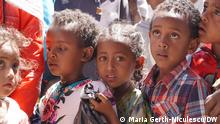 She identified children in need and is trying to do her part to prevent looming malnutrition. These displaced children are waiting in line with their parents for a macaroni distribution. Mekele, February 26th, 2021.
Photo: Maria Gerth-Niculescu/DW