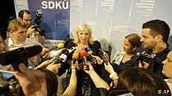 Iveta Radicova, leader of the Slovak Democratic and Christian Union and Democratic Party speaks to reporters