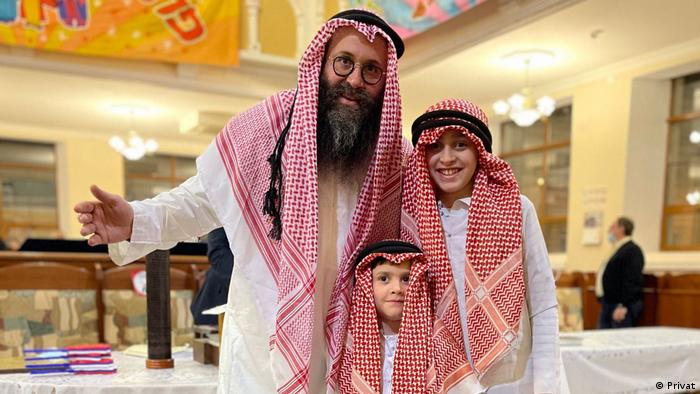 Rabbi Chaim Danzinger with his sons in Dubai