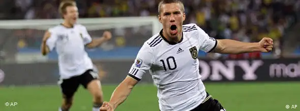 Germany's Lukas Podolski celebrates after scoring during the World Cup Group D soccer match between Germany and Australia at the stadium in Durban, South Africa, Sunday, June 13, 2010