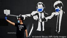 Un año con el coronavirus: grafitis sobre la pandemia en todo el mundo