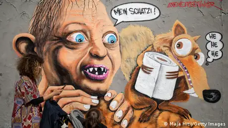 A painting of Gollum from Lord of the Rings saying My precious as he watches the squirrel Scrat from Ice Age stealing a roll of toilet paper. 