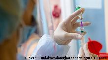 UZHHOROD, UKRAINE - MARCH 4, 2021 - A healthcare provider draws a dose of the CoviShield vaccine at the Zakarpattia Regional Clinical Infectious Diseases Hospital, Uzhhorod, western Ukraine., Credit:Serhii Hudak / Avalon