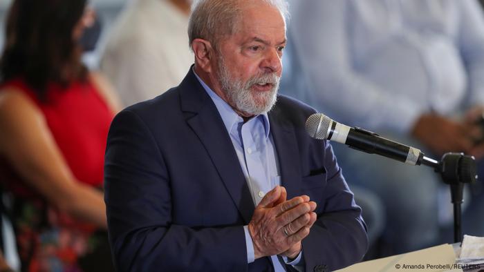 Luiz Inacio Lula da Silva clasps his hands together while giving a speech in March 2021