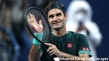 DOHA, QATAR - MARCH 10: Roger Federer of Switzerland celebrates winning his match against Dan Evans of Great Britain on Day 3 of the Qatar ExxonMobil Open at Khalifa International Tennis and Squash Complex on March 10, 2021 in Doha, Qatar. (Photo by Mohamed Farag/Getty Images)