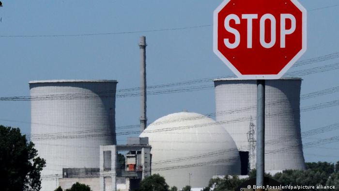 The nuclear power plant Biblis with a stop sign in the foreground