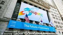 11/03/2021 In this photo provided by the New York Stock Exchange, a banner for South Korea's Coupang adorns the New York Stock Exchange facade before his company's IPO, Thursday March 11, 2021.The biggest IPO in years is rolling out Thursday on the NYSE where Coupang, the South Korean equivalent of Amazon in the U.S., or Alibaba in China, will begin trading under the ticker CPNG. (Courtney Crow/New York Stock Exchange via AP)