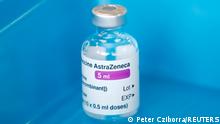 FILE PHOTO: A vial of the Oxford-AstraZeneca COVID-19 vaccine is seen at Basingstoke Fire Station, in Basingstoke, Britain February 4, 2021. REUTERS/Peter Cziborra/File Photo/File Photo