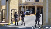 Gendarmerie officers stand guard at the gate of the new Salt government hospital in the city of Salt, Jordan March 13, 2021. REUTERS/Muath Freij NO RESALES. NO ARCHIVES