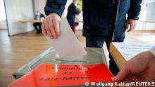 14.3.20212***
A man casts his vote for the federal state election of Baden-Wuerttemberg at Laiz near Sigmaringen, Germany, March 14, 2021. REUTERS/Wolfgang Rattay