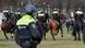 Dutch anti-riot police and mounted police officers detain confront a demonstration against the government and anti-COVID measures at The Hague Dutch anti-riot police and mounted police officers detain confront a demonstration against the government and anti-COVID measures at The Hague