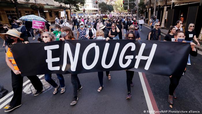 Thousands of people with placards and banners rally demanding justice for women in Sydney