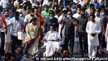 West Bengal chief minister Mamata Banerjee attends a rally of Trinamool Congress on a wheel chair as she was injured on her leg, before West Bengal assembly election in Kolkata, India, 14 March, 2021. (Photo by Indranil Aditya/NurPhoto)