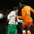 Mchezaji wa Cote dIvoire Didier Drogba aking'ang'ania mpira na Ricardo Carvalho wa Ureno
