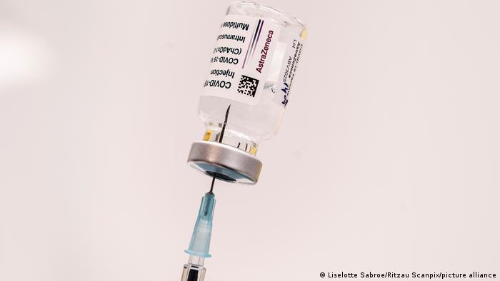 An AstraZeneca vaccine vial being prepared in Denmark