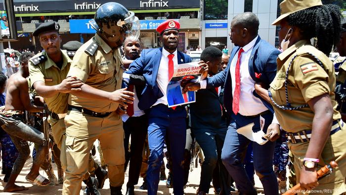 Bobi Wine is detained by riot-policemen