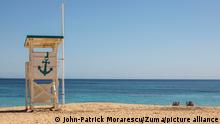 March 15, 2021, Magaluf, Mallorca, Spain: Two woman lying in sun chairs next to a lifeguard tower on the beach during the lockdown in Magaluf in Mallorca. (Credit Image: Â© John-Patrick Morarescu/ZUMA Wire