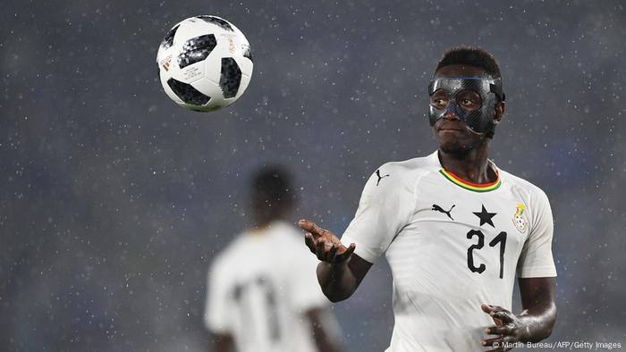 Andy Yiadom catches the ball in a game for Ghana.