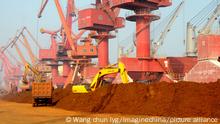 --FILE--An excavator loads a truck with rare earth at the Port of Lianyungang in Lianyungang city, east Chinas Jiangsu province, 31 October 2010. China has created a state planning zone covering the countrys biggest rare earth mines in a move to cut production of the vital rare mineral elements used for numerous high-tech goods, the official Xinhua news agency reported on Thursday (10 February 2011) night. Exploration and mining of rare earth resources in the zone, an area of 2,500 square kilometers of Jiangxi province in southern China that contains 760,000 metric tons of rare earth mineral deposits, will be subject to stricter state scrutiny and regulatory checks, Xinhua said, citing the Ministry of Land and Resources in Beijing. Chinas rare earth reserves only account for a third in the world but China supplies more than 90 percent of rare earths globally, that is obviously not sustainable, a ministry official was quoted as saying. China, which produces about 97 percent of the global supply of the minerals, cut export quotas for the minerals by 40 percent in 2010, a move that alarmed buyers and trading partners. Beijing has cut export quotas for the first half of 2011 by 35 percent from the first half of last year, although total quotas for this year have not yet been announced.
