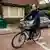 Mark Rutte is seen cycling to work