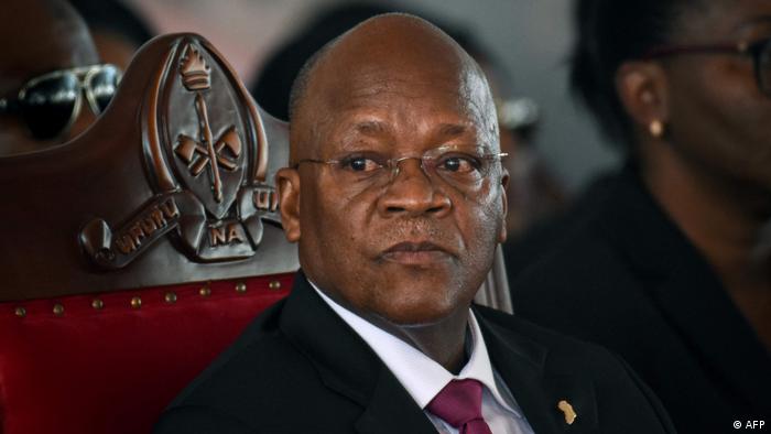 In this file photo taken on July 29, 2020 Tanzanian President John Magufuli attends the burial ceremony of the former Tanzanian President Benjamin Mkapa has died age 81 at Mkapa’s home village in Lupaso, southern Tanzania.