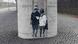 Street art with anti-racist message: white boy walking arm in arm with black boy Street art with anti-racist message: white boy walking arm in arm with black boy